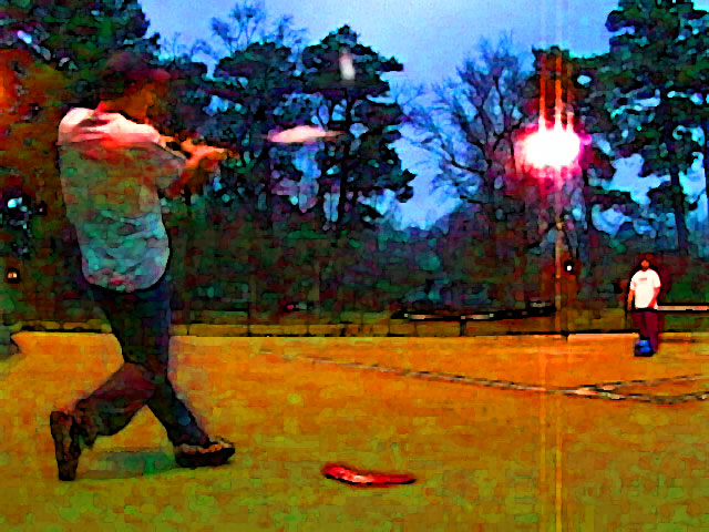 artsy photo of Jeff hitting a home run